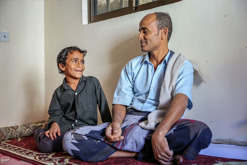 Bilal and Hael sharing a smile